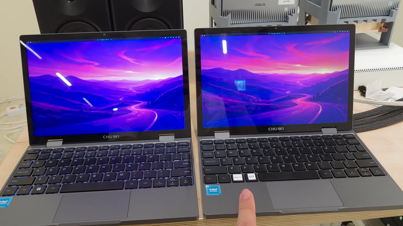 Two MiniBook X laptops side by side: U300 on the left, N150 on the right.